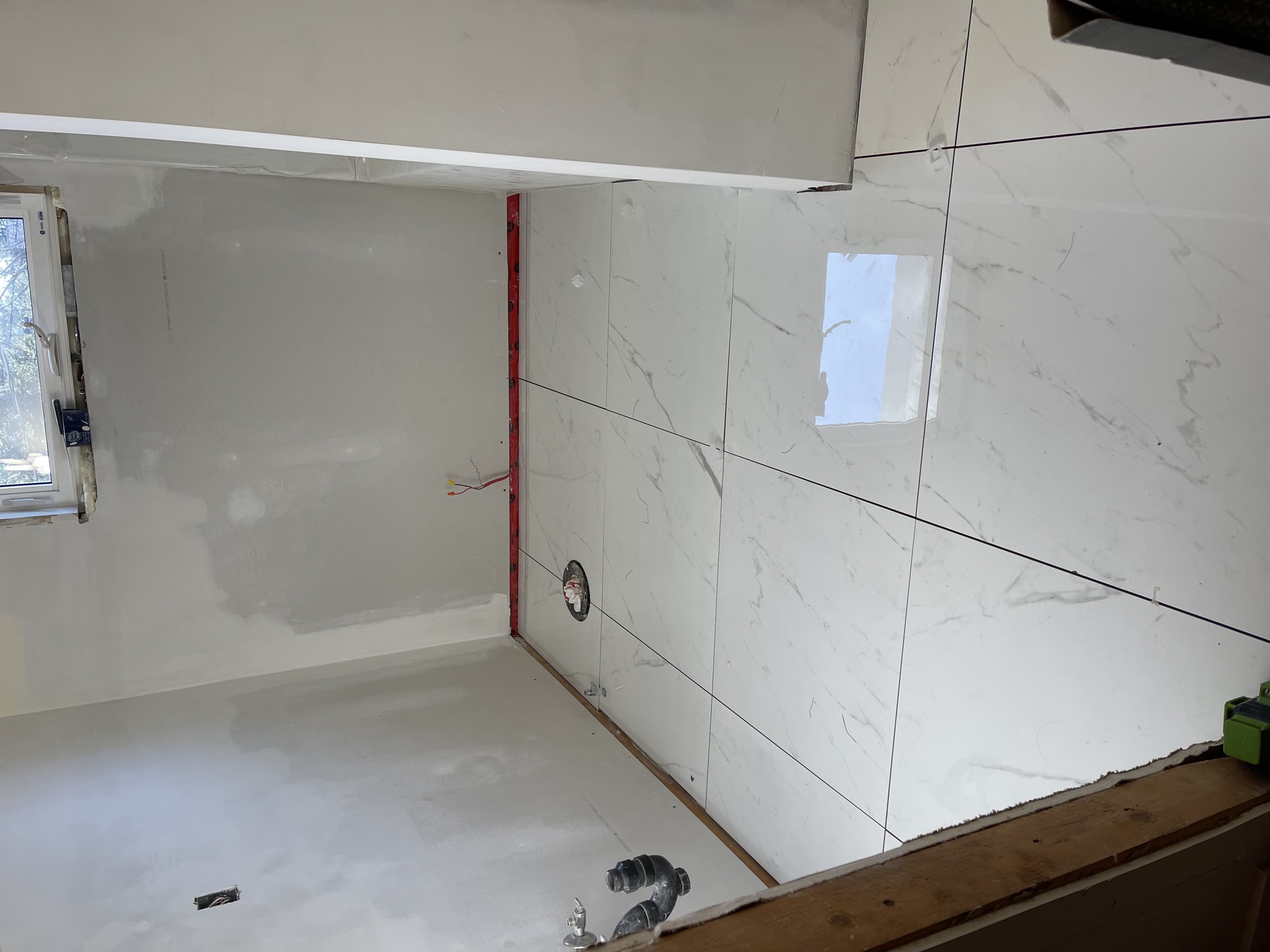 Luxury bathroom with large tile work.